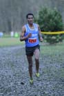 Eritrean athlete Weynay Ghebresilasie running for Sunderland Harriers on his way to third place in the Start First North East Harrier League, Jarrow.